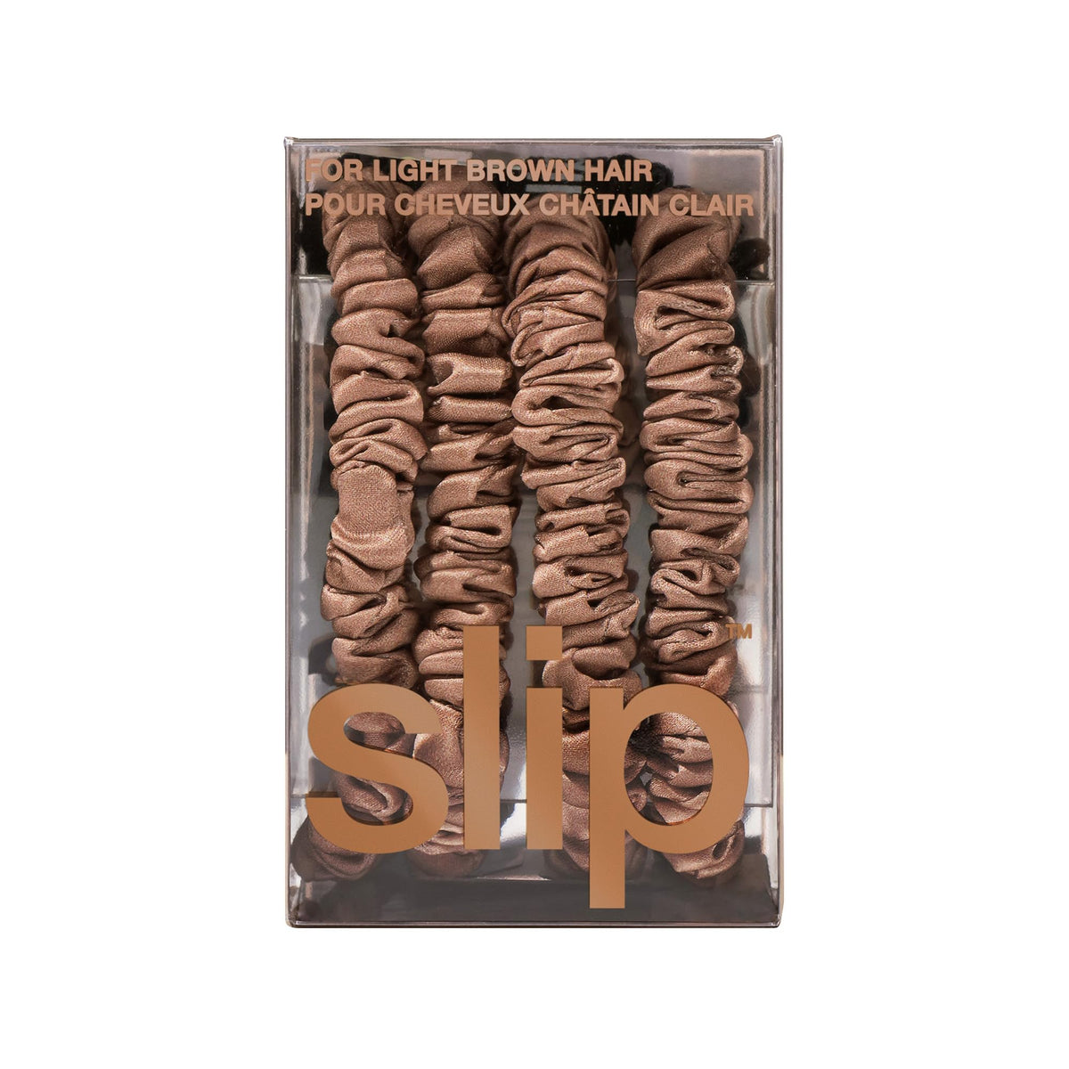 Scrunchies en soie SLIP ensemble sur une surface douce