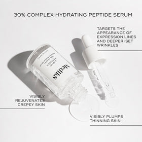 Sérum Medik8 Peptides sur un fond de marbre blanc