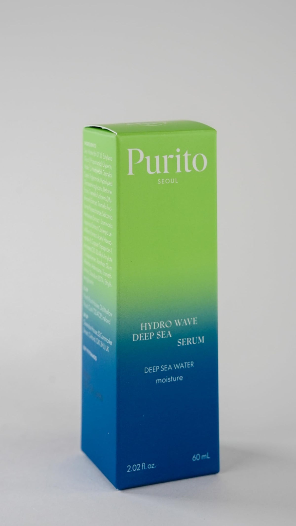 Sérum PURITO avec gouttes sur une surface
