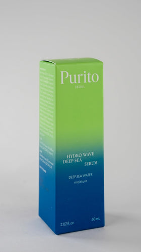 Sérum PURITO avec gouttes sur une surface