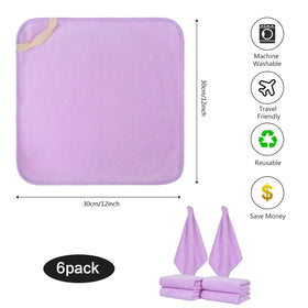 Serviette en microfibre SINLAND pliée sur une surface