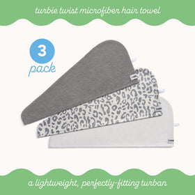 Serviette Turbie Twist en microfibre sur un fond neutre, mise en valeur des textures