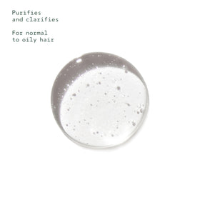 Shampooing Aveda 60g prêt à l'emploi sur le lavabo