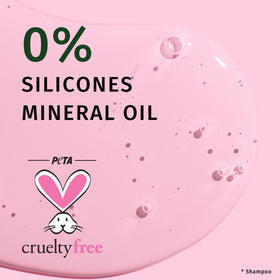 Shampooing Herbal Essences Rose Hips sur fond floral