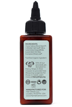 Shampooing sec Hair Dance en format 91g sur une table