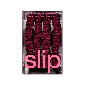 SLIP scrunchies maroon près d'un miroir