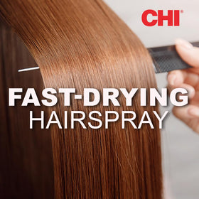 Spray CHI Infra Texture 100g sur une coiffeuse avec accessoires