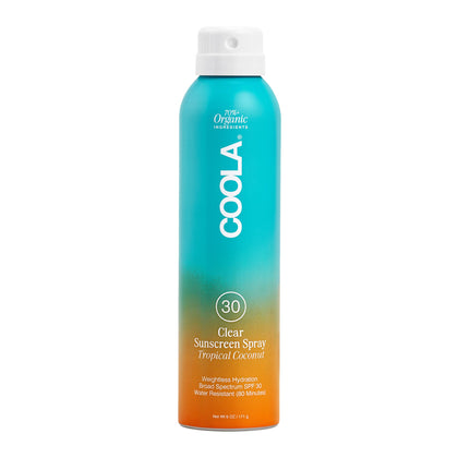 Spray solaire COOLA SPF 30 modèle avant avec parfum noix de coco