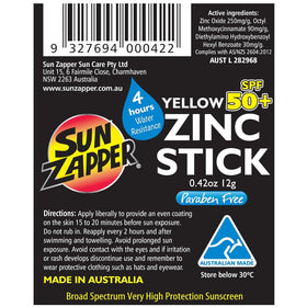 Stick solaire Sun Zapper sur une serviette de plage