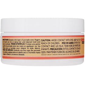 Suavecita Pomade 2,3 oz avec des cheveux stylisés en vagues