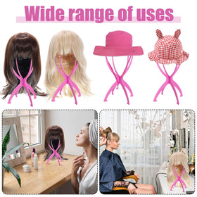 Support de perruque rose obeoby avec un chapeau