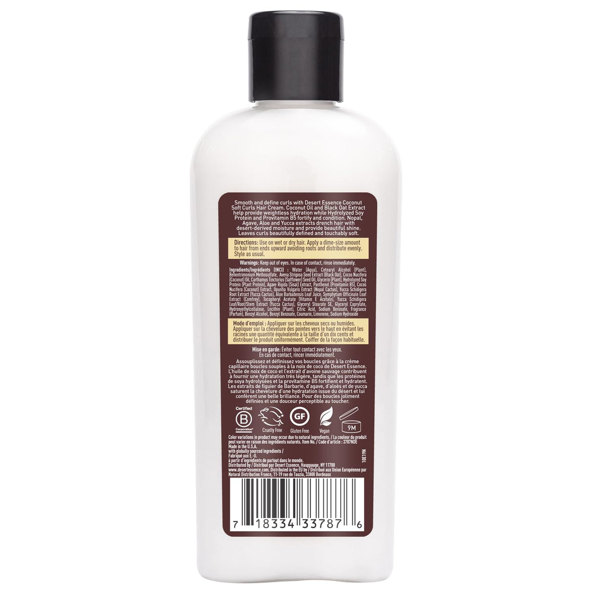 Texture de la crème pour cheveux bouclés Desert Essence sur une main