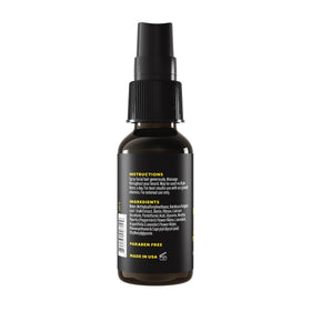 The Beard Club huile de croissance de barbe Biotin avec gouttes sur le sol