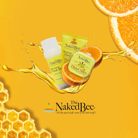 The Naked Bee Lotion Nourrissante 240 ml avec ingrédients naturels en arrière-plan