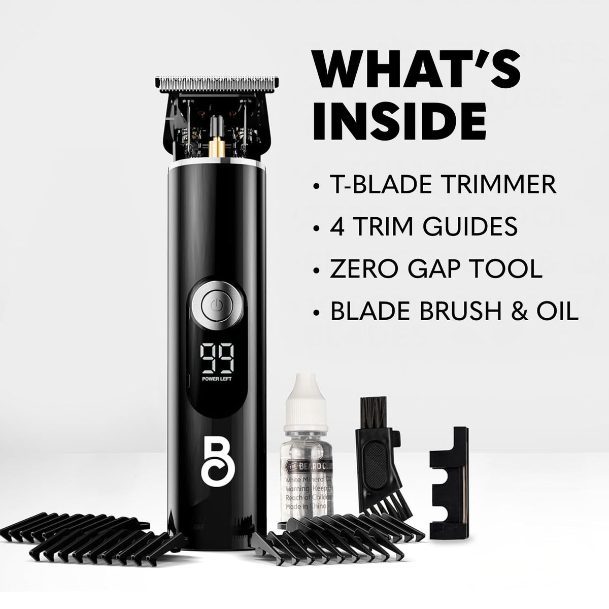 Tondeuse à barbe T-Blade The Beard Club sur une table de grooming