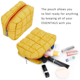 Trousse de maquillage E-Tree jaune à côté d'autres accessoires de beauté