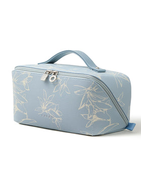 Trousse de maquillage EACHY bleue vue de face avec motifs floraux