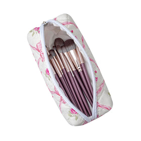 Trousse de maquillage HHQQWZ rose sur un fond blanc
