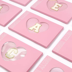 Trousse de maquillage rose mibasies avec accessoires de beauté