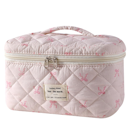 Trousse de maquillage voyage uekeboag avec motif floral vue de face