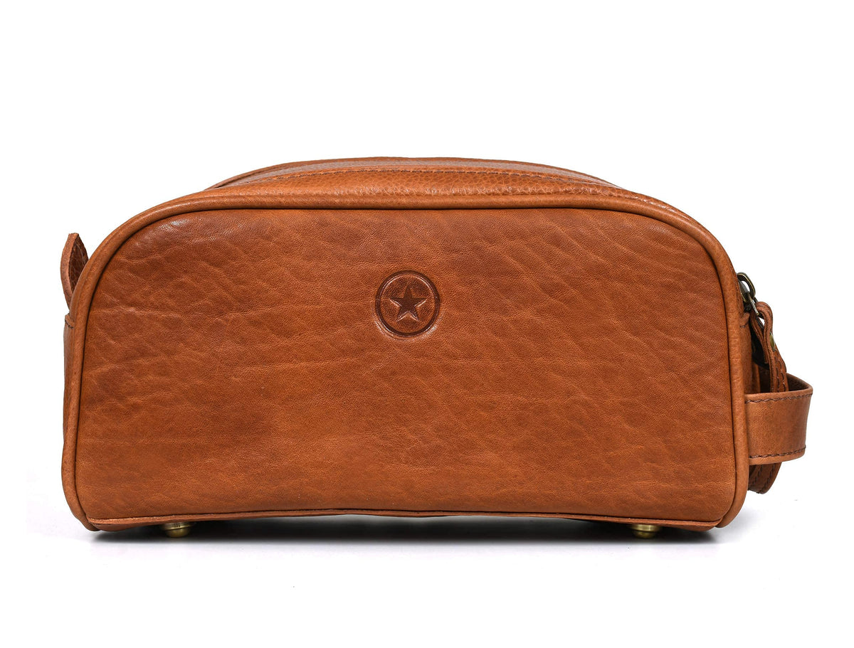 Trousse de toilette AARON posée sur une table