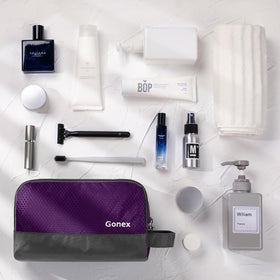 Trousse de toilette Gonex ouverte avec divers produits de soin