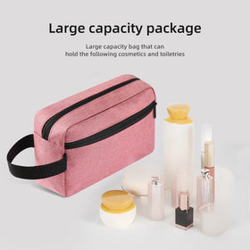 Trousse de toilette Icramsy rose pâle ouverte avec accessoires