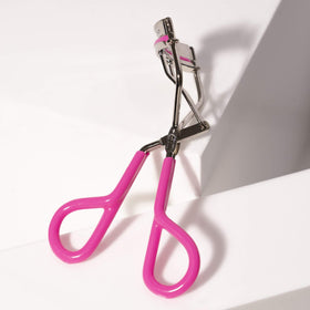 Tweezerman Recourbe Cils Grip Confort Rose Fluo vue de côté