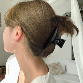 Utilisation des pinces à cheveux Ondder pour réaliser une coiffure