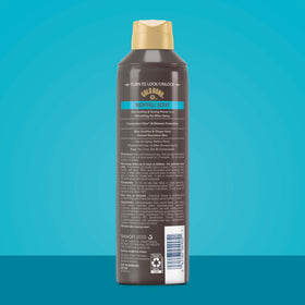 Vaporisateur corporel Gold Bond sur une surface bien éclairée