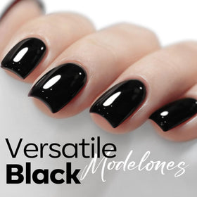 Vernis à ongles gel noir modelones avec d'autres vernis en arrière-plan
