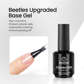 Vernis à ongles noir beetles en train de sécher sous une lampe LED