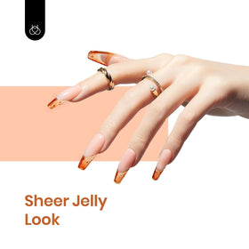 vernis gel orange avec effet scintillant sur ongles