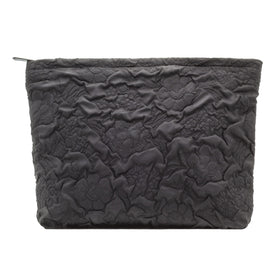 Vue avant de la trousse de maquillage plate PAZIMIIK noire à fleurs