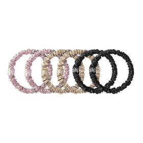 Vue d'ensemble du set de scrunchies en soie SLIP