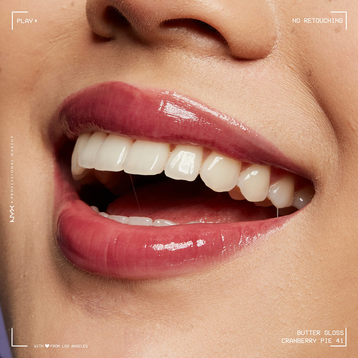 Zoom sur la texture crémeuse du NYX Butter Gloss sur une main